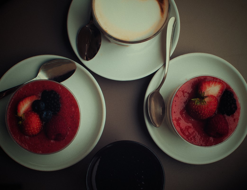 Berry cheesecake parfait with fresh strawberries and blueberries